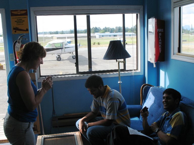 Rita Methorst and the Canakapelli brothers.  Langley Flying School.